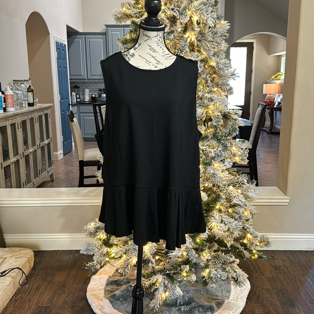 Sleeveless peplum top